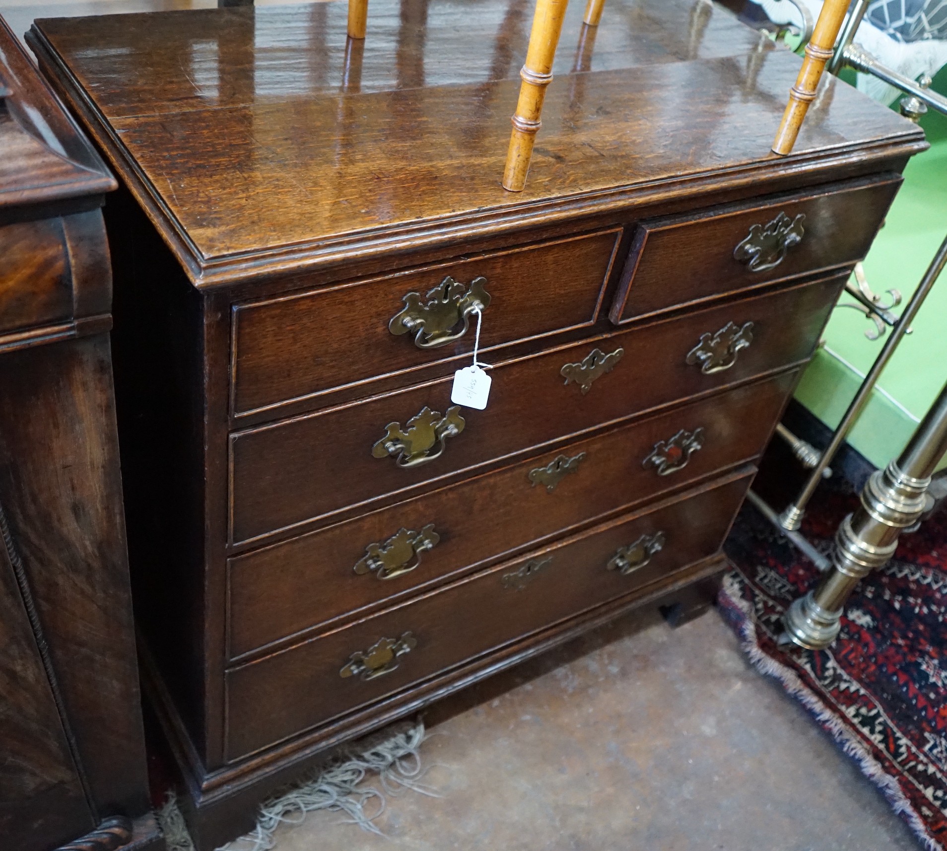 A George III oak chest of drawers, width 94cm, depth 49cm, height 95cm